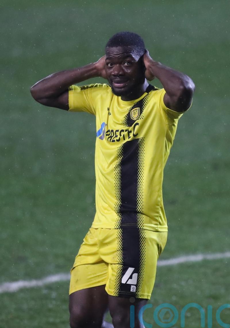 Burton beat high-flying Wycombe despite first-half Deji Oshilaja dismissal