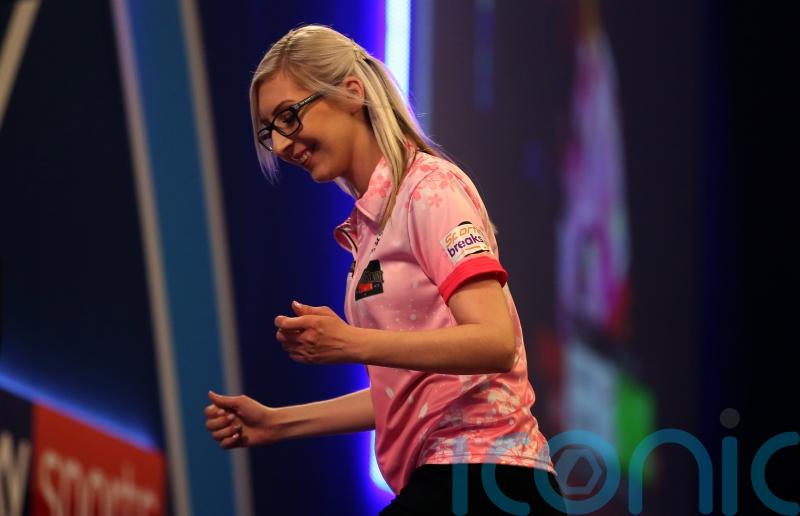 Fallon Sherrock becomes first woman to hit nine-dart finish in PDC event