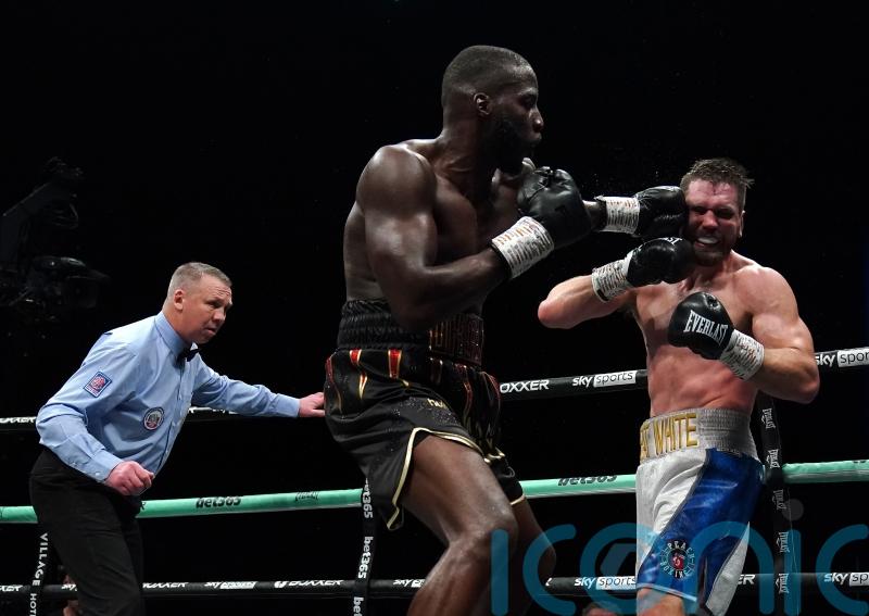Lawrence Okolie makes successful title defence in scrappy win over David Light