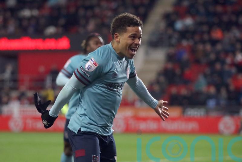 Champagne on ice for Burnley as draw at Rotherham keeps them waiting for title