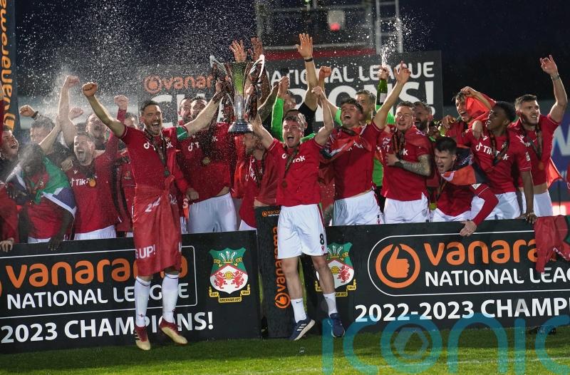 Wrexham recover from early setback to seal their return to the Football League