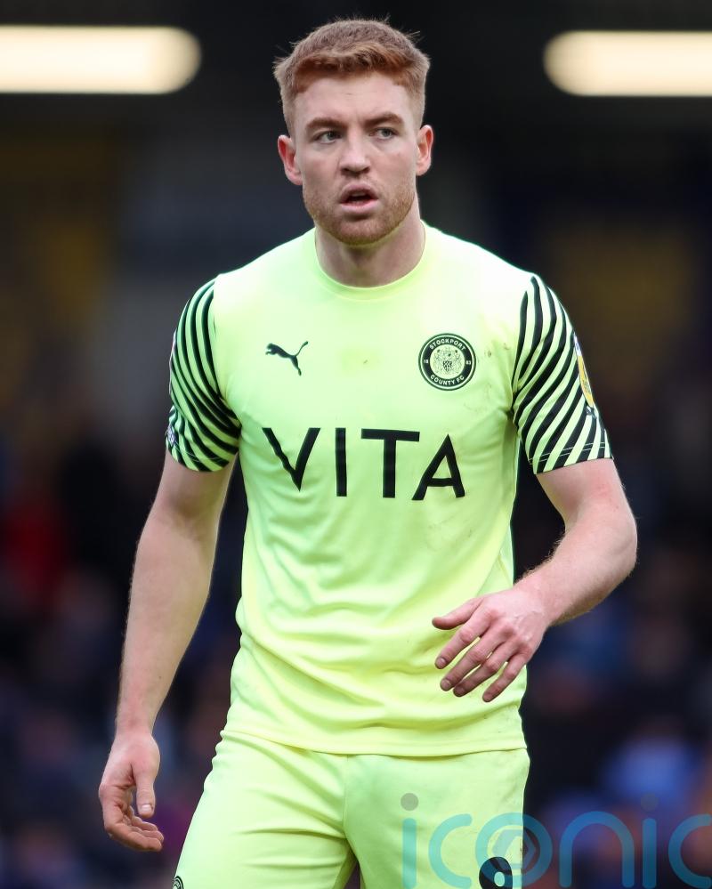 Stockport keep alive automatic promotion hopes with win at champions Orient