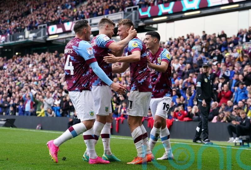 Champions Burnley join the 100 club with comfortable victory over Cardiff