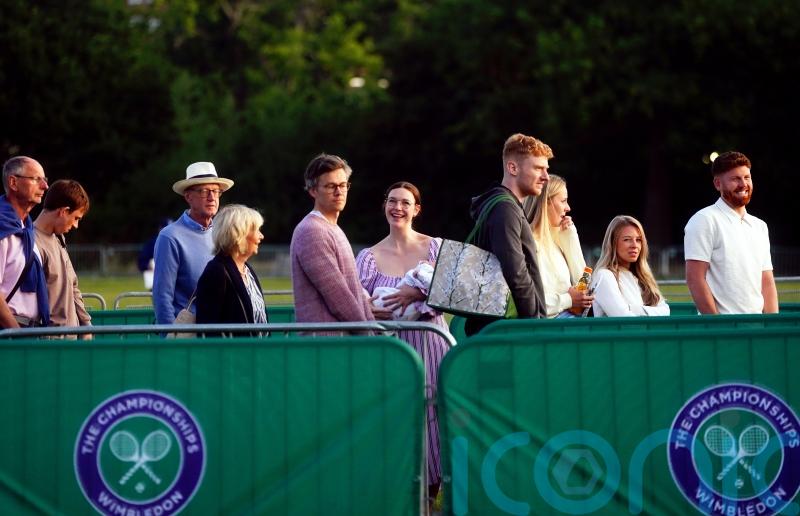 Wimbledon fans may have to battle through rain to watch day two