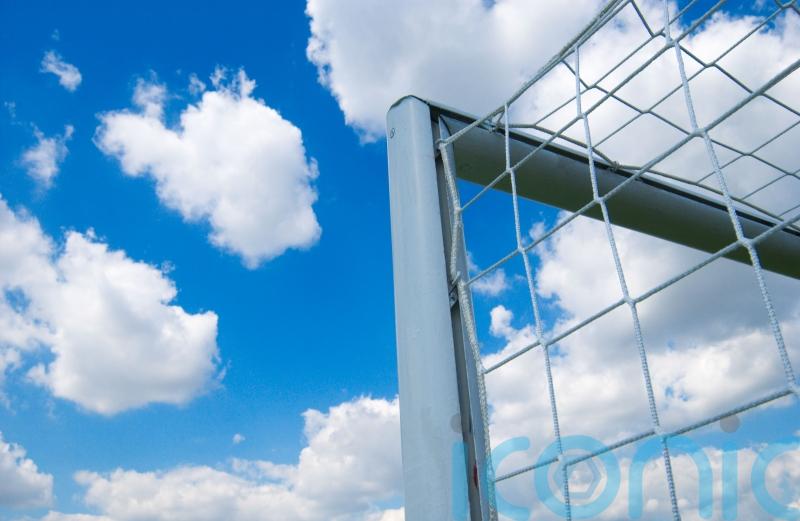 Football match abandoned as men wearing balaclavas drive hearse on to pitch