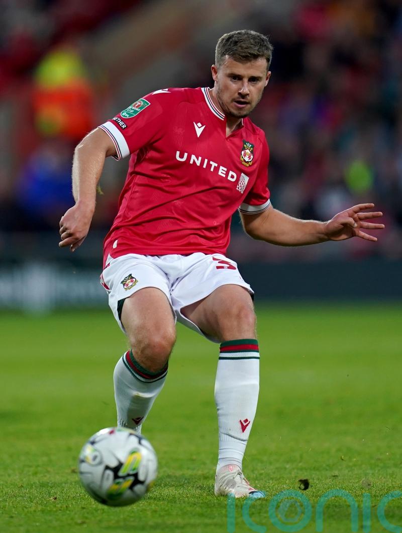 Wrexham beaten on penalties as Bradford reach third round