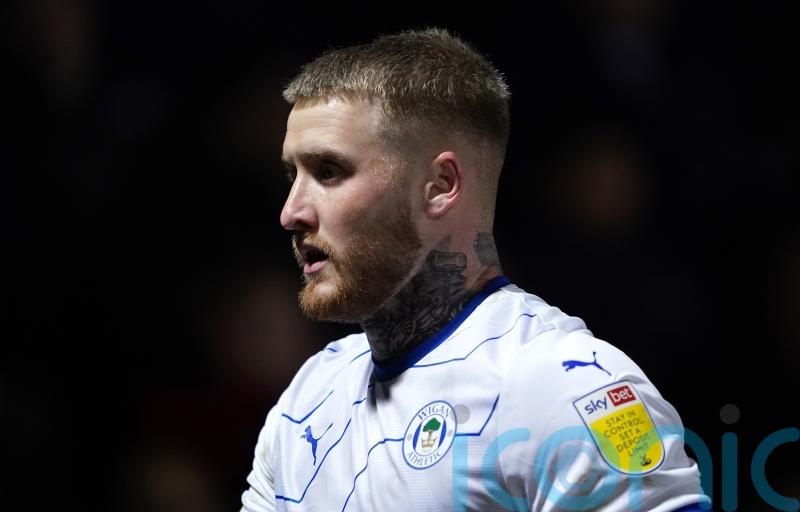 Wigan ease to victory against 10-man Shrewsbury