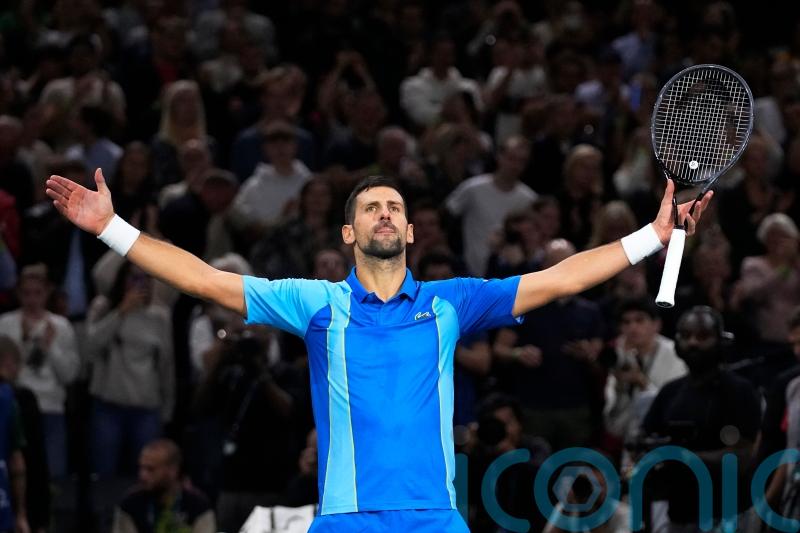 Novak Djokovic overcomes booing crowd to beat Holger Rune at Paris Masters