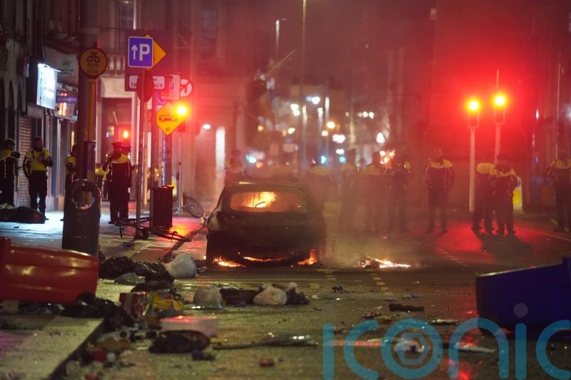 Police condemn &lsquo;gratuitous thuggery&rsquo; as rioting breaks out after knife attack