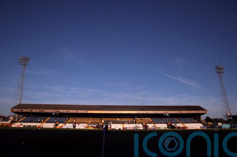 Managerless Cambridge thrash Fleetwood to reach FA Cup third round