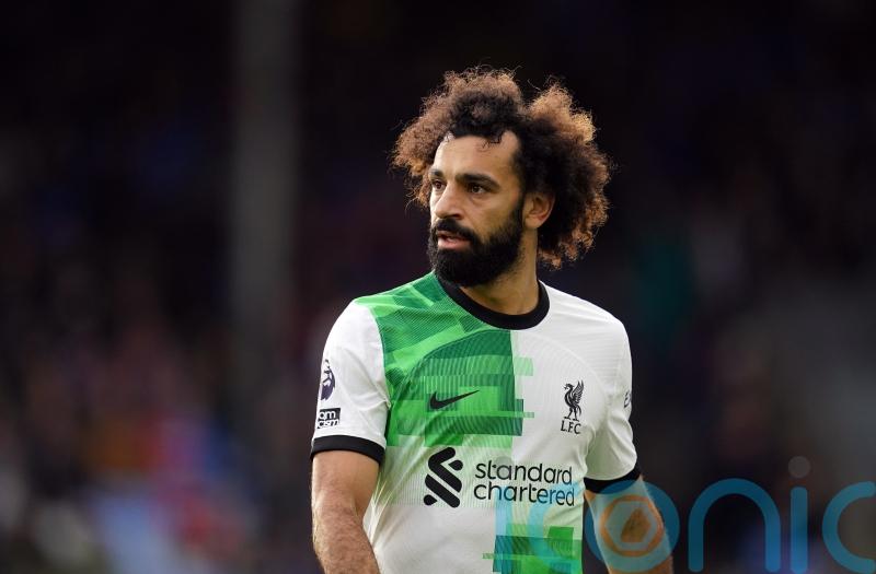 Salah happy with record-breaking goal but has sights set on Premier League title