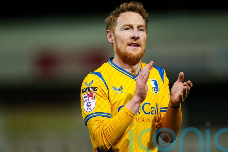 Mansfield keep up promotion chase as Sutton woes continue