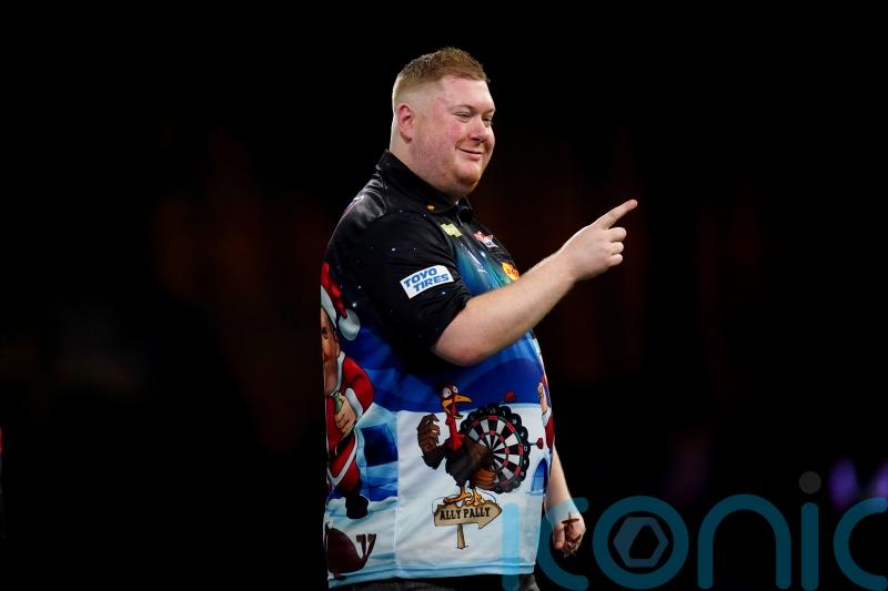 Ricky Evans stuns Nathan Aspinall with straight-sets second round victory