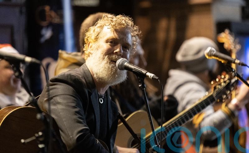 Thousands of Dubliners gather to watch annual Christmas Eve charity busk