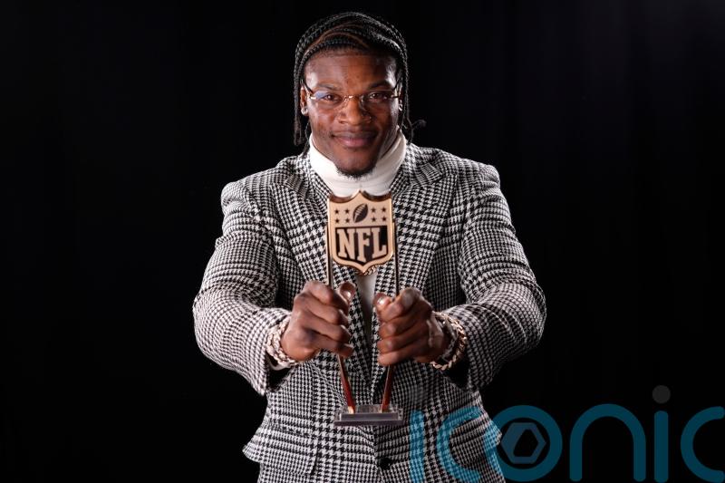 Lamar Jackson collects second NFL MVP award