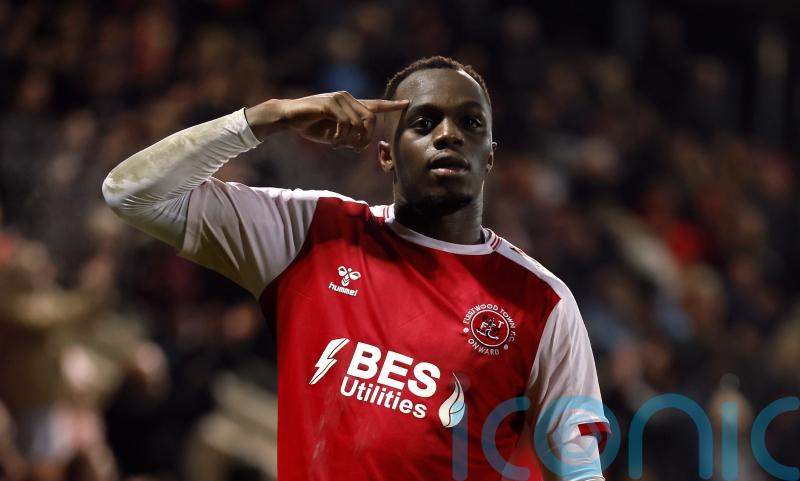 Bolton win at Cambridge to move level with second-placed Derby