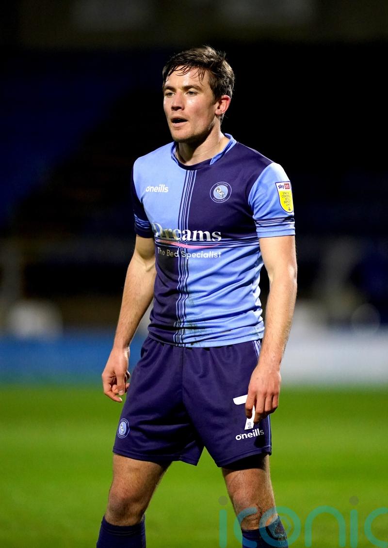 Barnsley make it three wins on the spin with victory at 10-man Wycombe