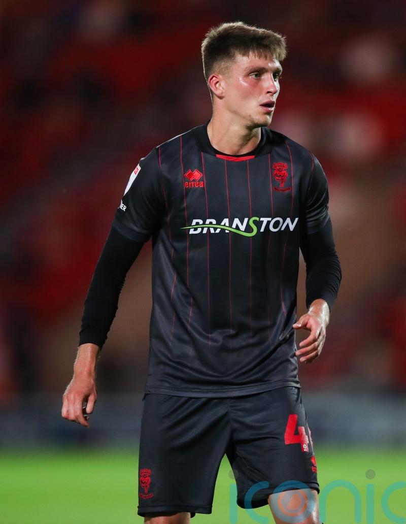 Woking escape relegation zone with victory over in-form Kidderminster