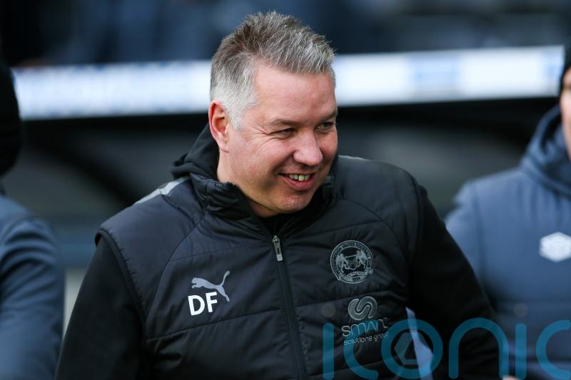 Darren Ferguson says Peterborough building momentum in promotion race
