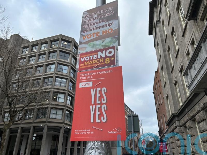 Polls open in twin referenda over changes to Constitution