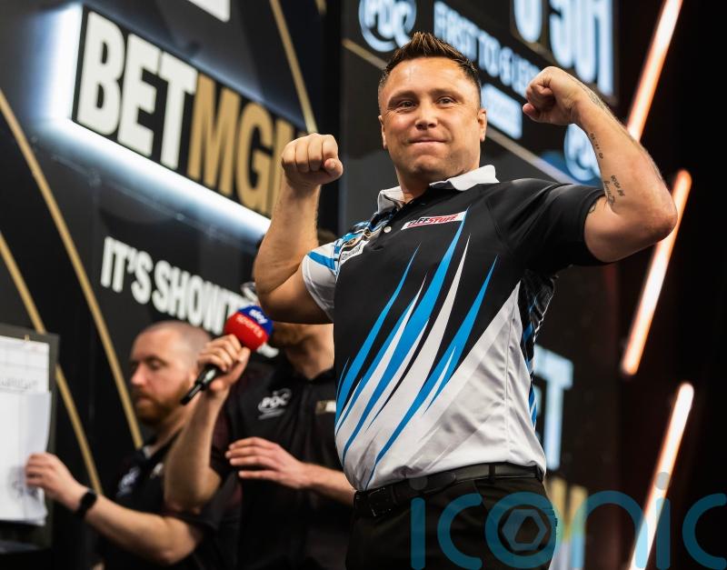 Gerwyn Price fires nine-dart finish on his way to the final in Manchester