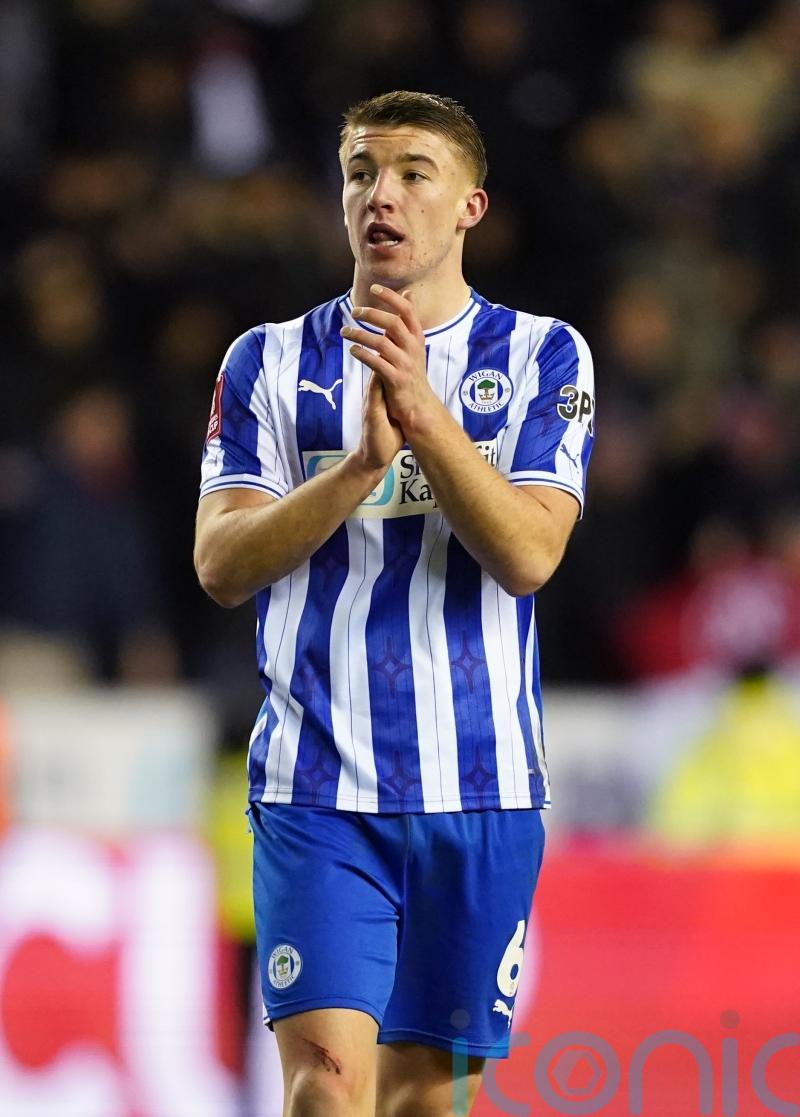 Lincoln&rsquo;s impressive unbeaten run ended as Wigan snatch last-gasp victory