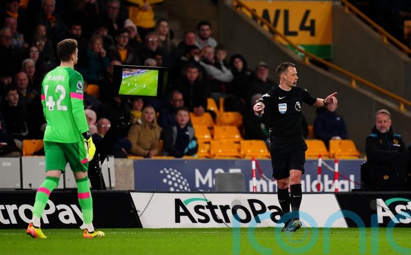 Stuart Attwell at the heart of the action again in Bournemouth&rsquo;s win at Wolves