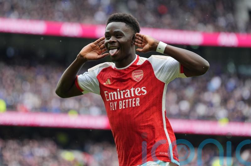 Arsenal withstand Tottenham&rsquo;s second-half fightback to boost title hopes