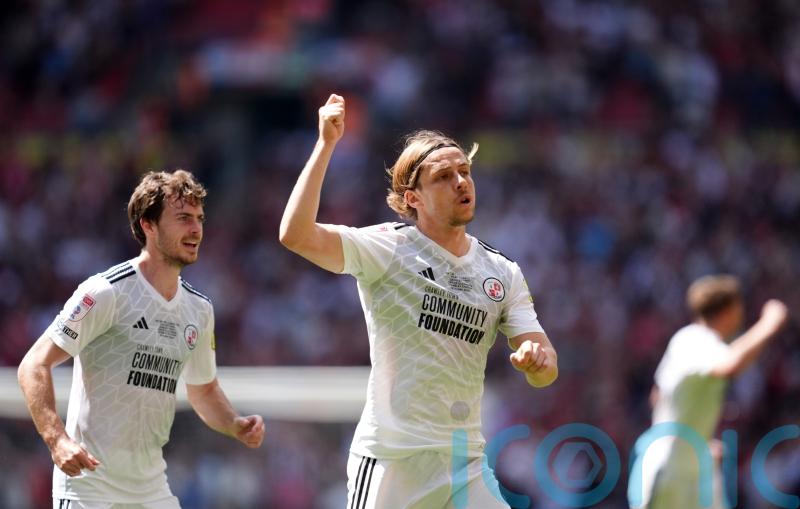 Crawley celebrate promotion with play-off victory over Crewe