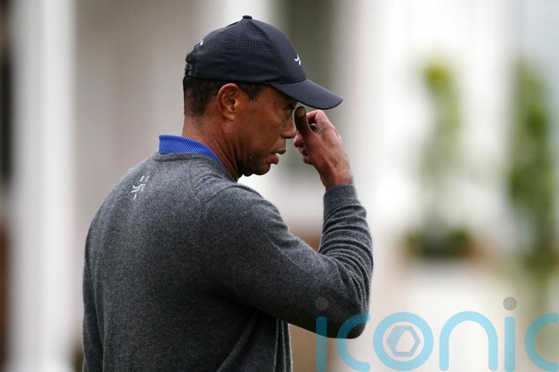 Tiger Woods cuts frustrated figure after 79 leaves him fighting to make Open cut