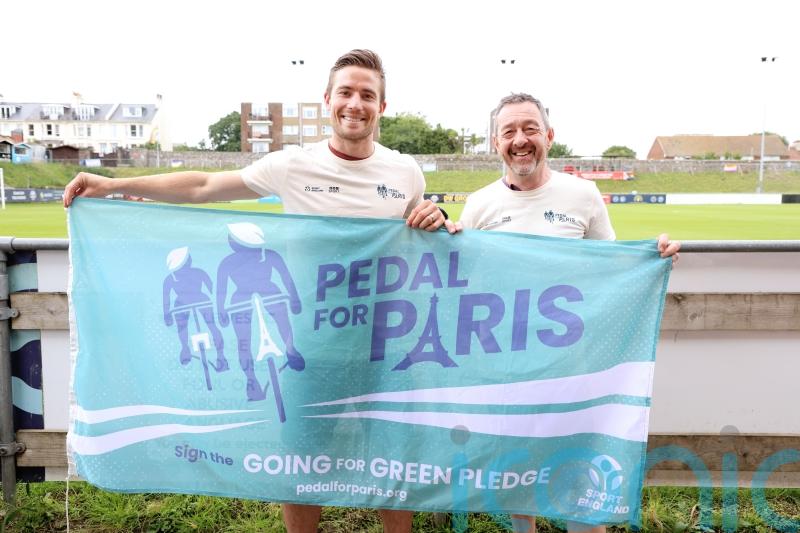 Olympic champion visits football club during climate action bike ride to Paris
