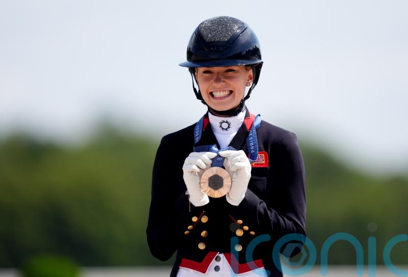 Charlotte Fry celebrates adding individual bronze to team triumph