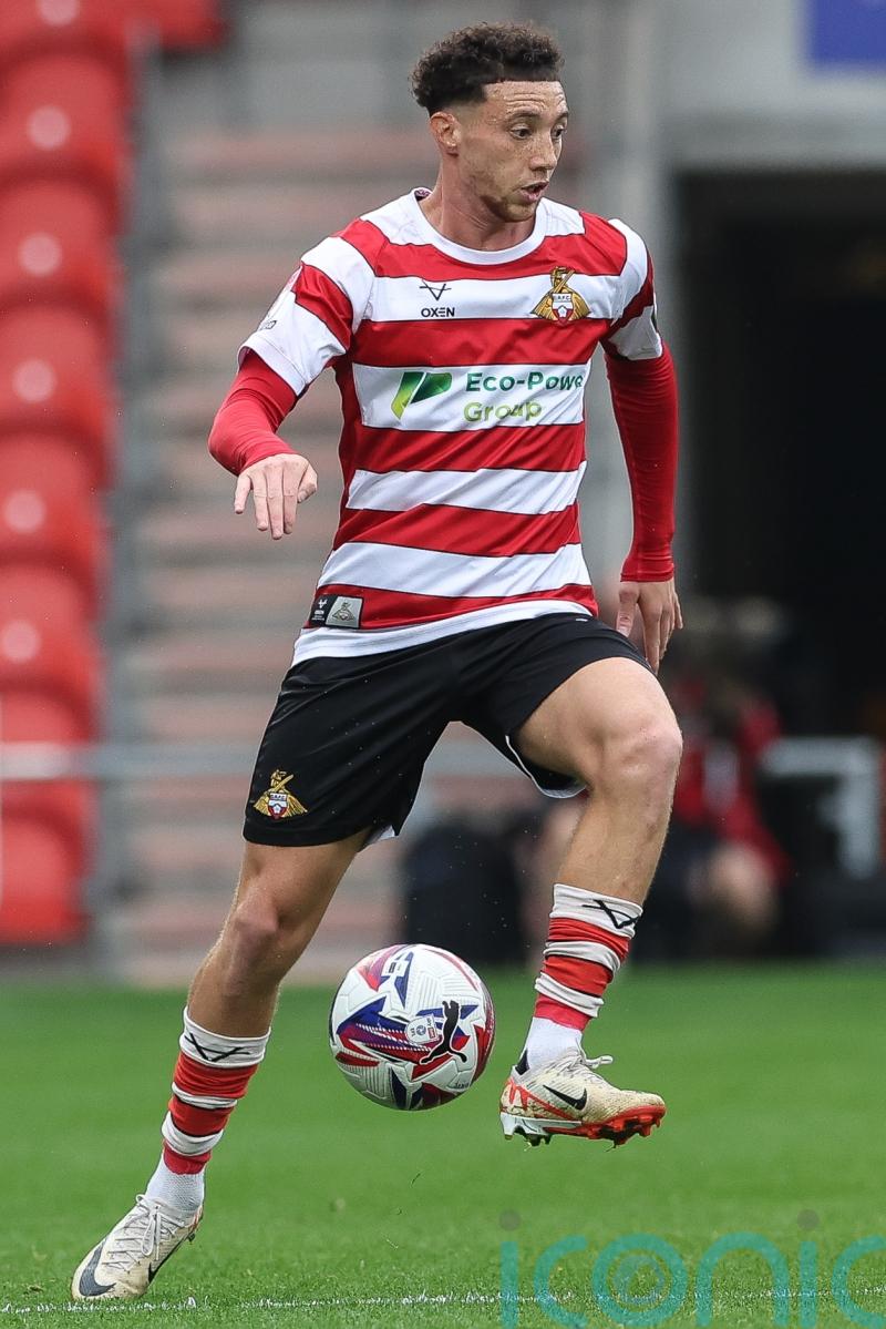 Jordan Gibson&rsquo;s brace helps Doncaster to victory at 10-man Grimsby