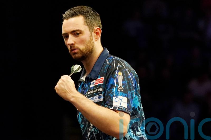 Defending World Grand Prix champion Luke Humphries marches on in Leicester