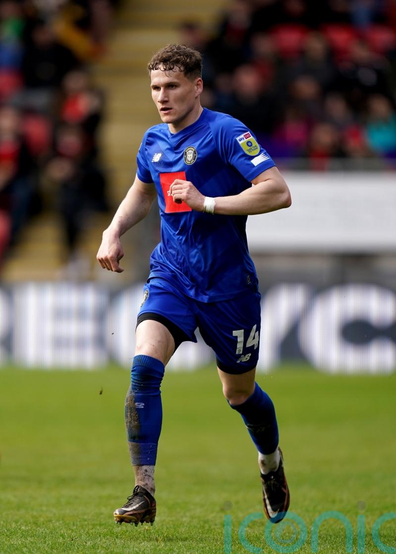 Toby Sims header guides Harrogate to victory over Newport