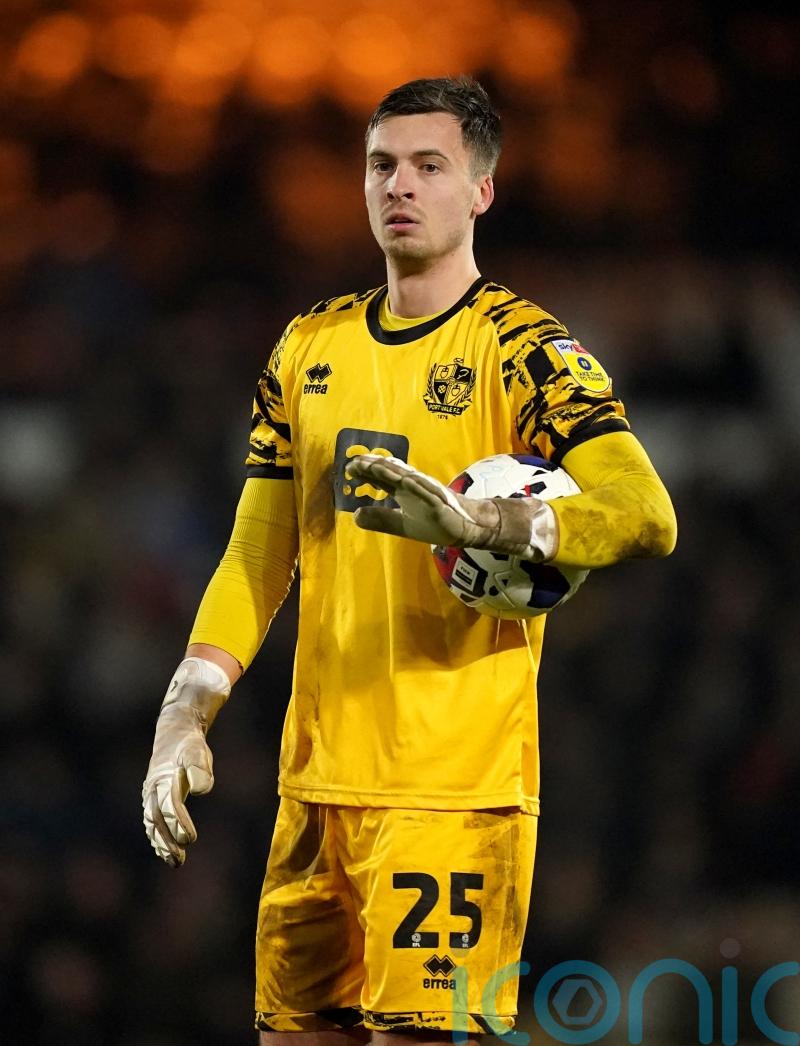 Cambridge hold on for point against high-flying Barnsley