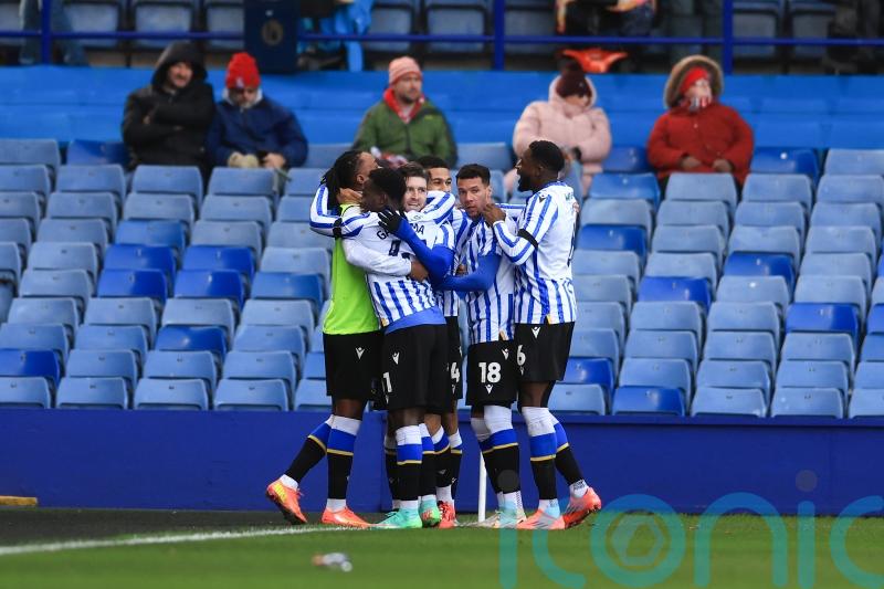 Josh Windass and Callum Paterson fire 10-man Sheffield Wednesday past Stoke