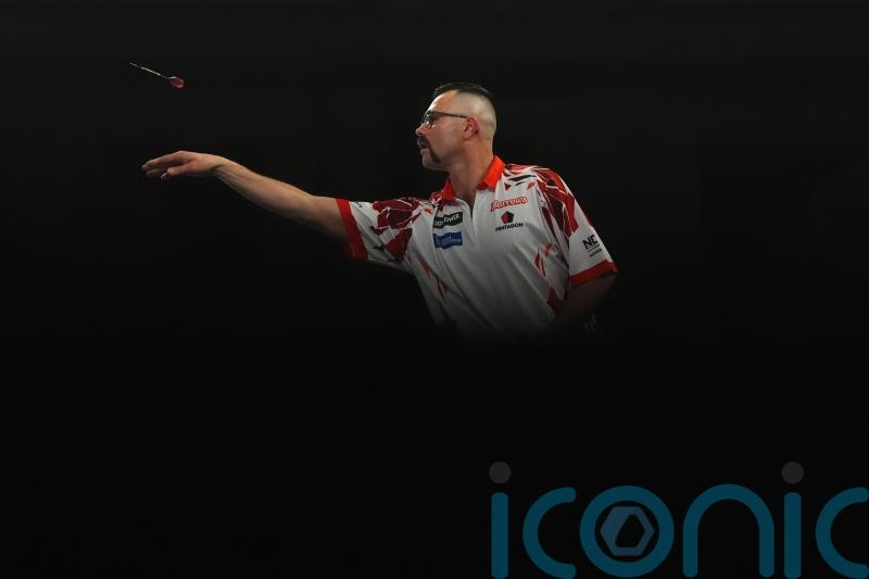 Damon Heta lands nine-darter as World Championship resumes