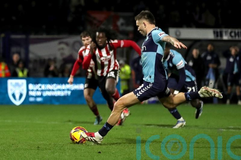 Late Aaron Morley penalty winner sends Wycombe top