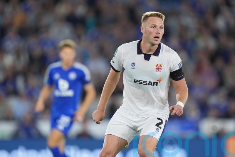 Swindon stun nine-man Tranmere with late flurry