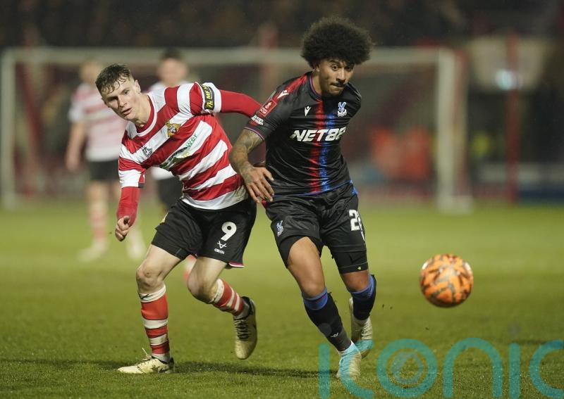 Rob Street on target as 10-man Doncaster edge lowly Morecambe to go third