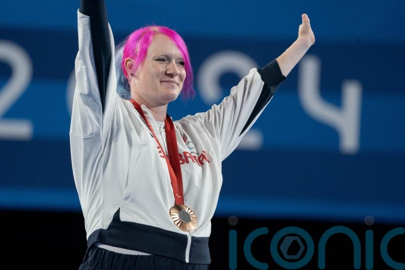 Archer Jodie Grinham delighted to prove motherhood doesn&rsquo;t end sporting careers