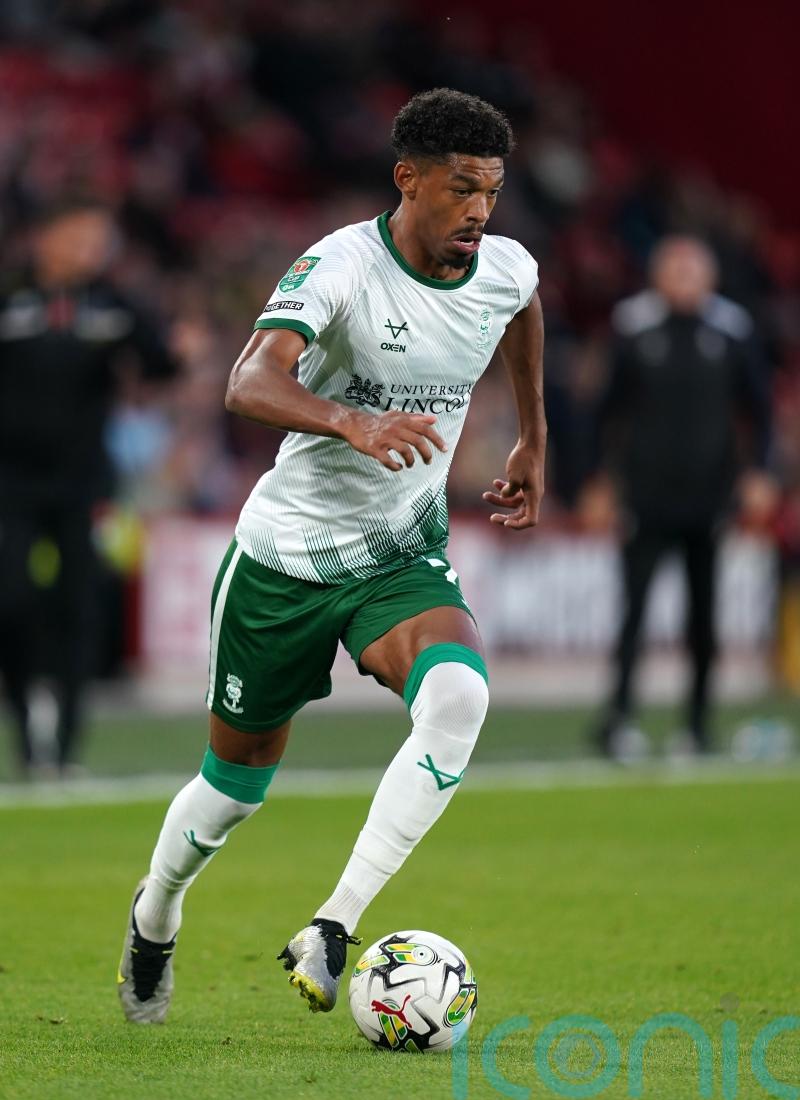 Reeco Hackett earns Lincoln victory against Huddersfield