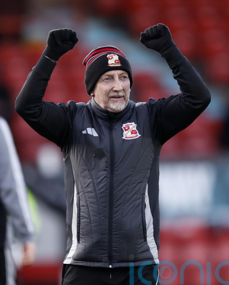 Ian Holloway salutes Swindon supporters after dramatic victory over Bradford