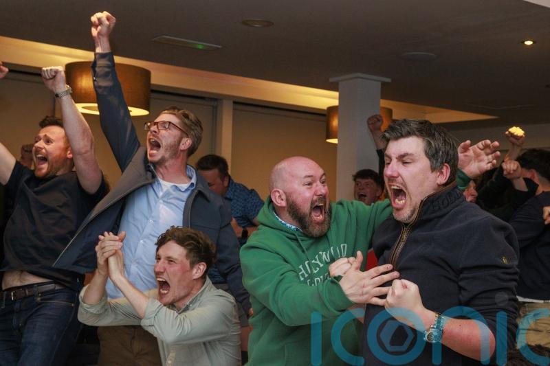 Joyous scenes at McIlroy&rsquo;s hometown club after members endure night of drama