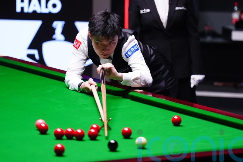 Zhao Xintong leads Mark Williams 11-6 after day one of World Championship final