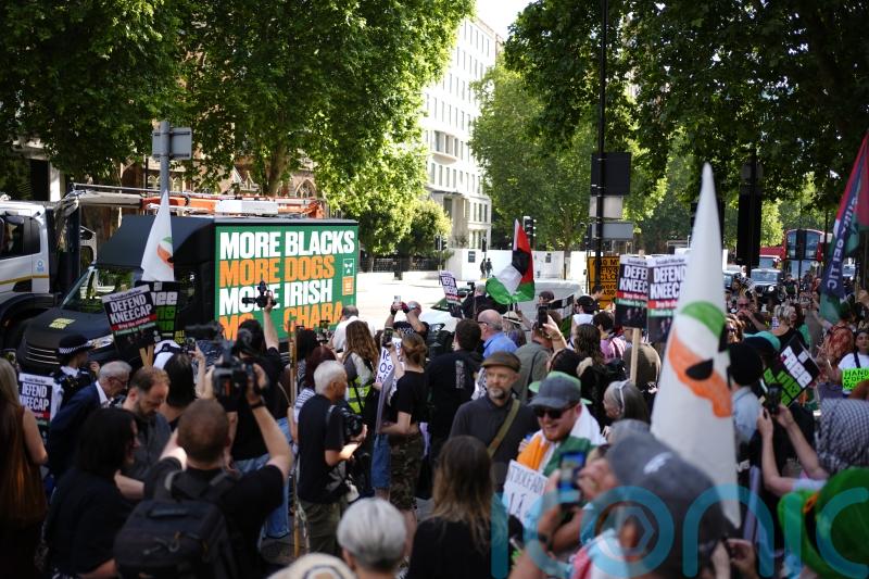 Kneecap &lsquo;plasters&rsquo; London with message of support for group member due in court