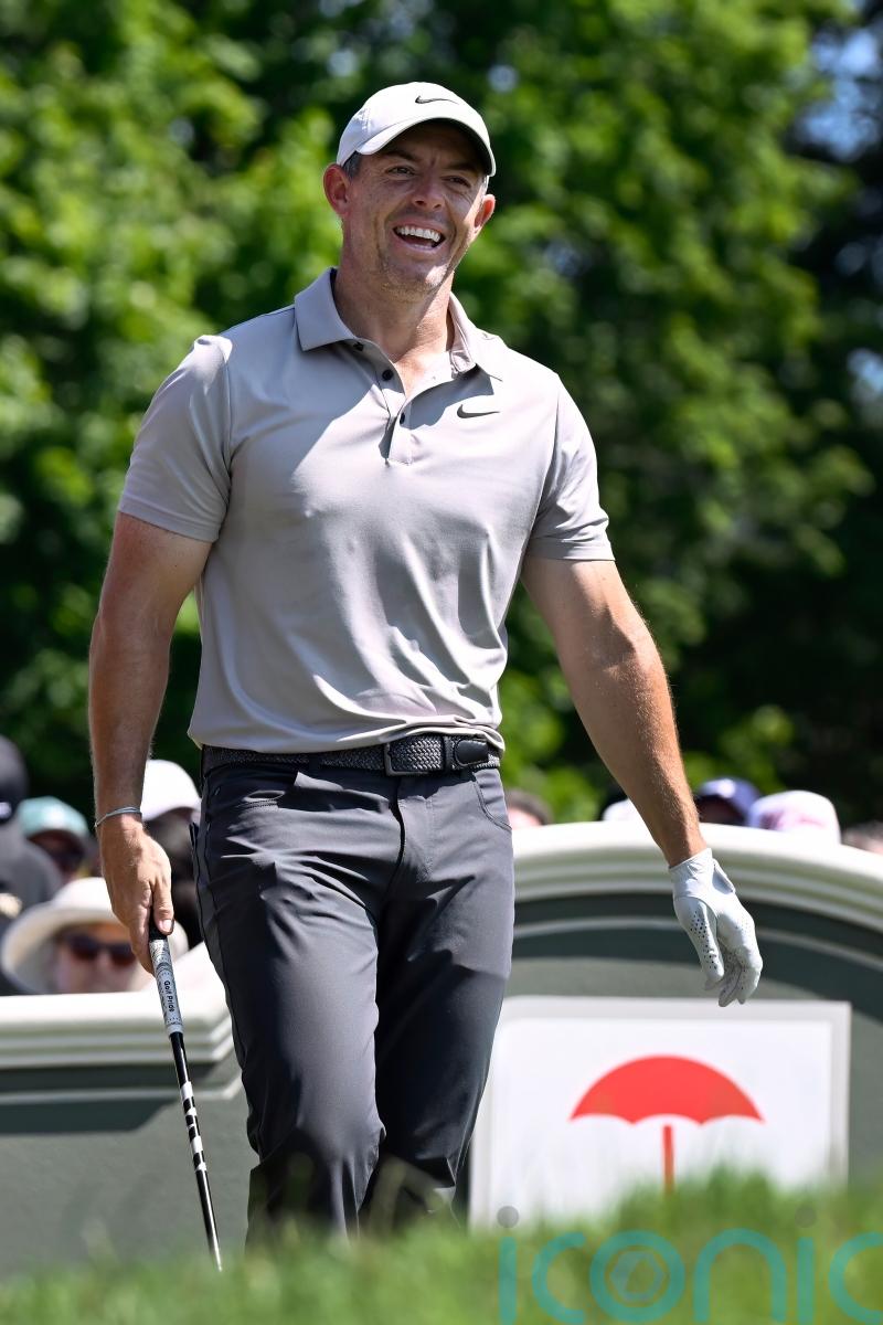 Rory McIlroy trails by two as Scottie Scheffler holds share of lead