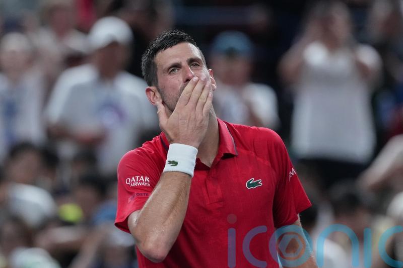 Novak Djokovic collapses in Shanghai heat but battles back to reach last eight