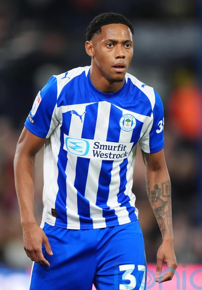 Ten-man Wigan return to winning ways against in-form Port Vale